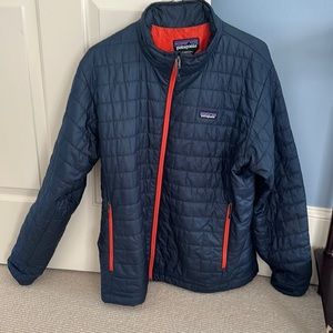 Men’s navy and red Patagonia Nano Puff jacket
